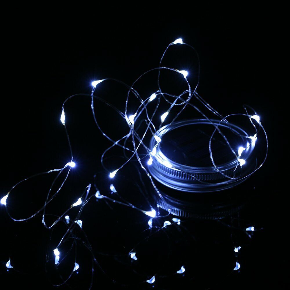 Magical Mason Jars: Double the Fun with Solar-Powered Fairy Lights for Enchanting Garden Decor!